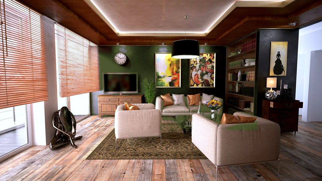 After — deep olive accent wall, same angle