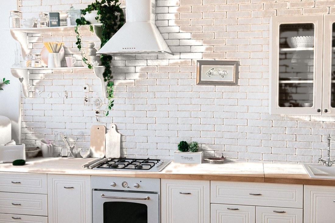 After — white kitchen cabinets, same layout